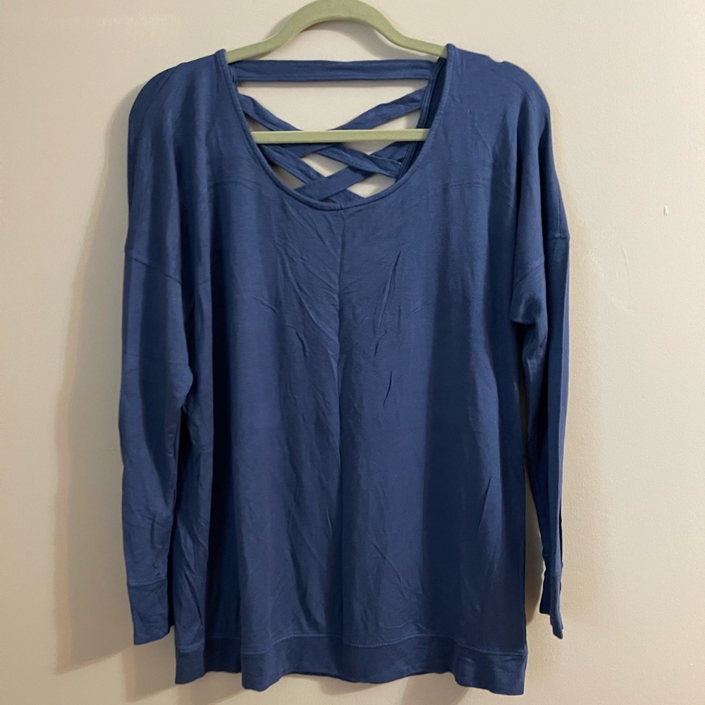 Athleta size L long sleeve blue shirt with criss cross back detailing